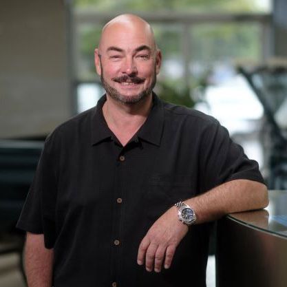 A picture of Dahl Ford smiling towards the camera