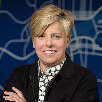 Headshot of Laura "Divot" Ekizian 