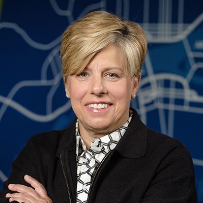 Headshot of Laura "Divot" Ekizian