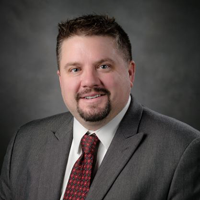 Headshot of Adam Thrap 